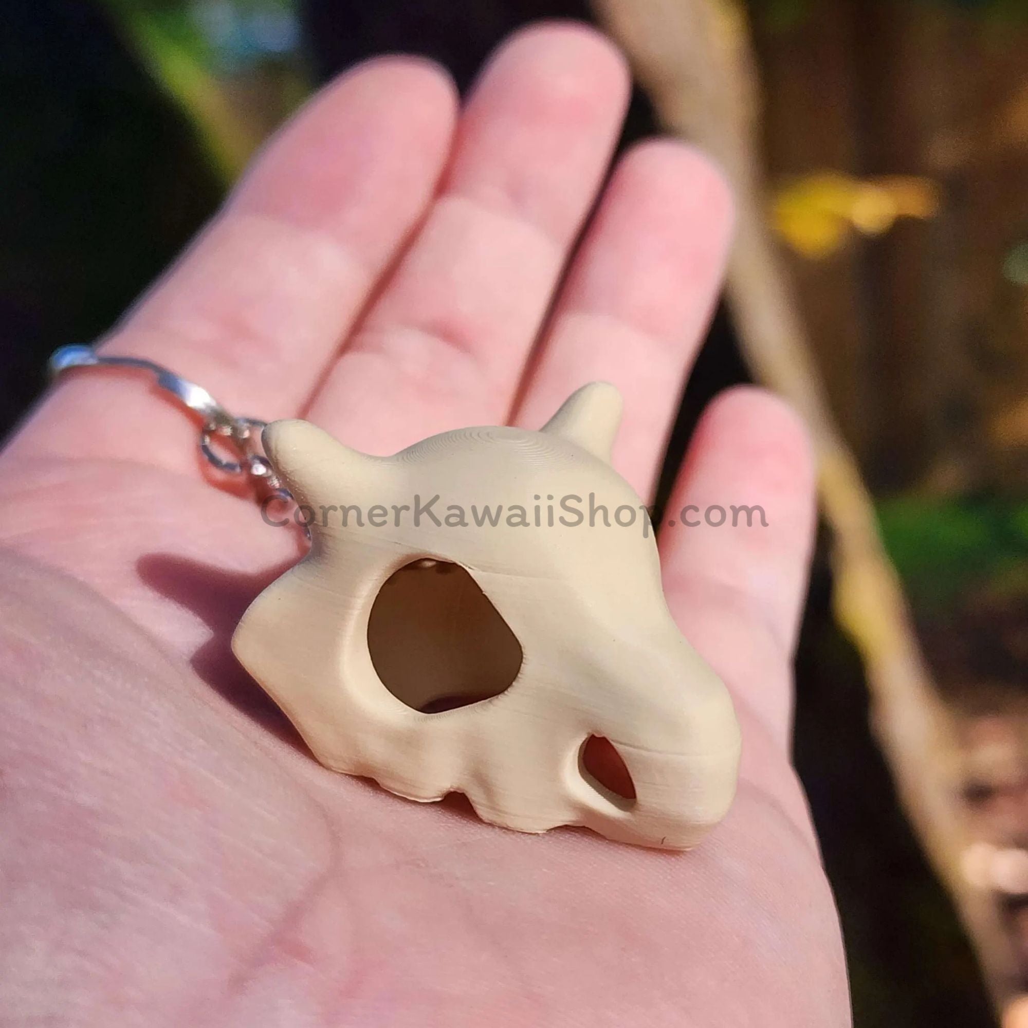 Cubone skull keychain 3D print layer detail close-up